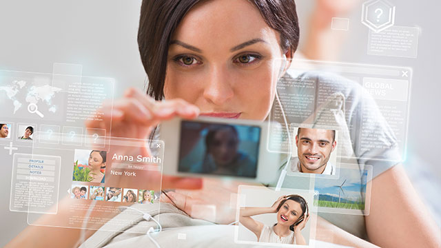A woman connecting to social media "friends"