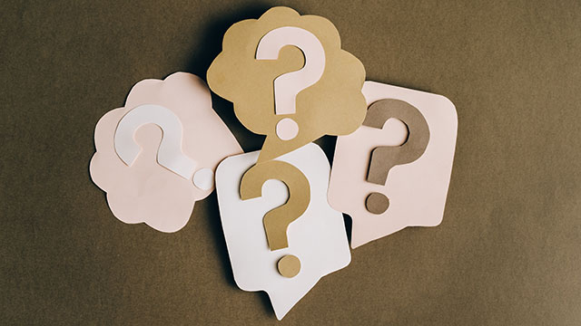 handmade question marks on paper