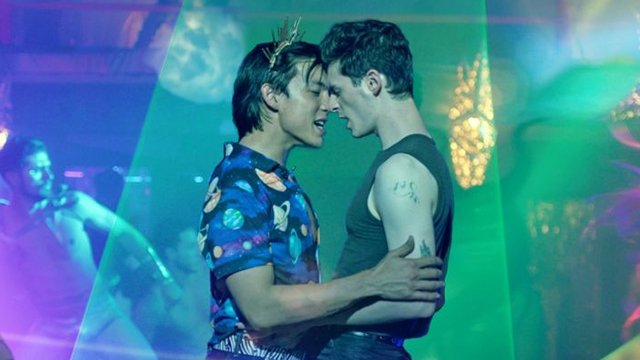 Alex Diaz and Alan Cammish in "Glitter & Doom"
