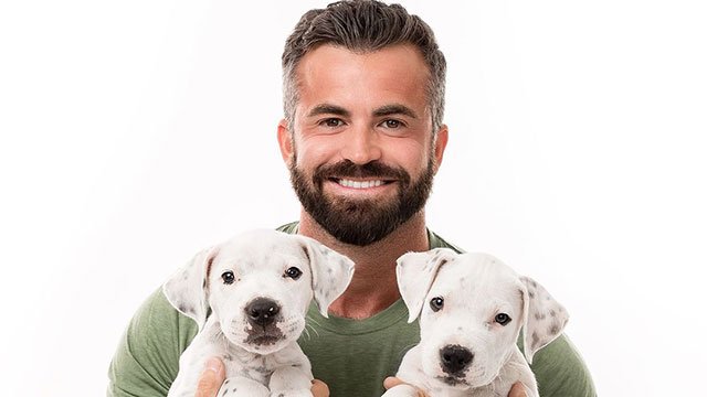Fran Tomas posed with pups for a good cause