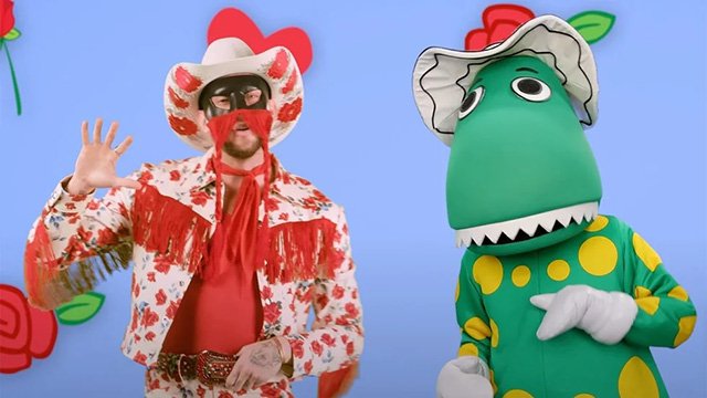 Orville Peck and Dorothy the Dinosaur