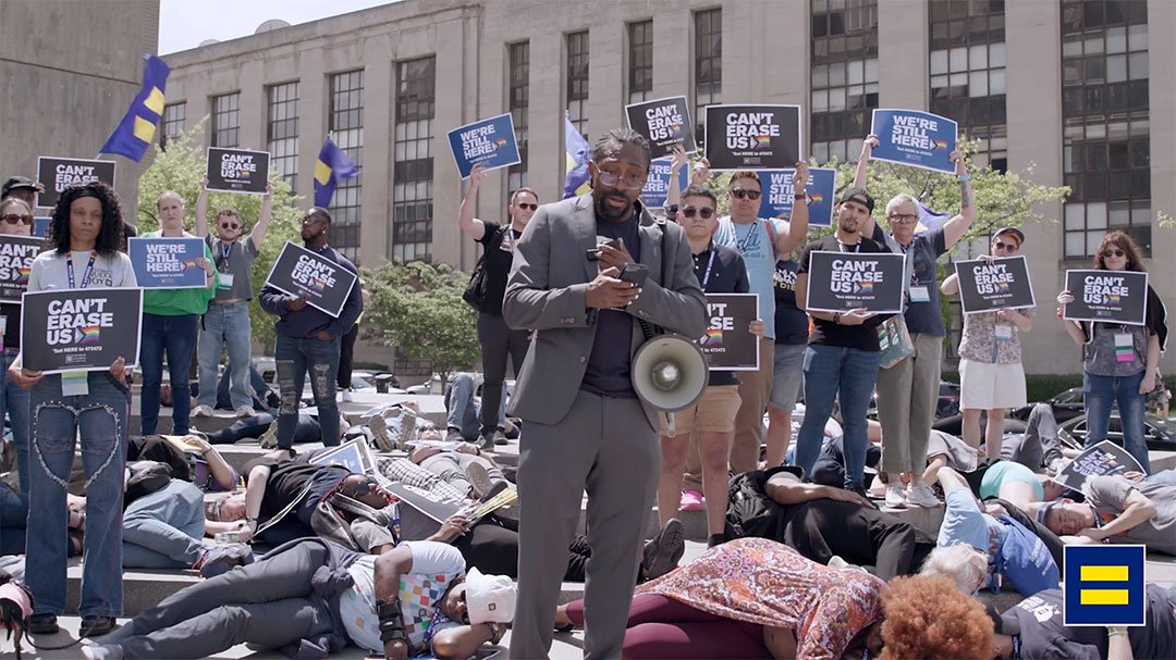Matthew Rose speaking at a die-in on the steps of the Health and Human Services Department