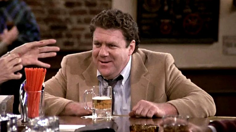 George Wendt as Norm on CHEERS (screen capture)