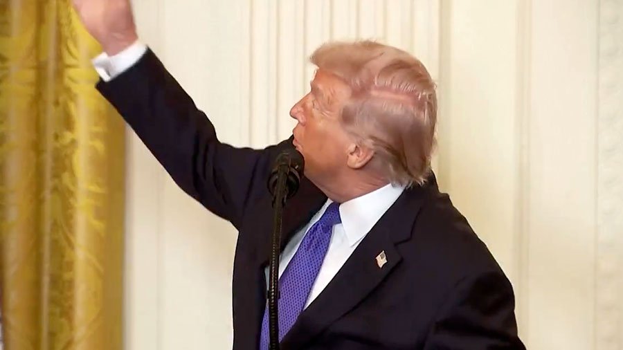 Speaking to reporters about current airstrikes in Iran, Trump pivots to the "beautiful gold drapes" in the room