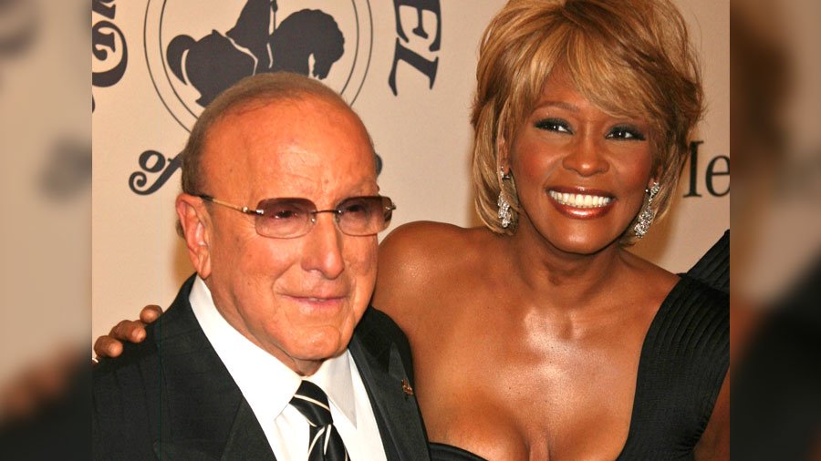 Clive Davis with Whitney Houston (image via Depositphotos)