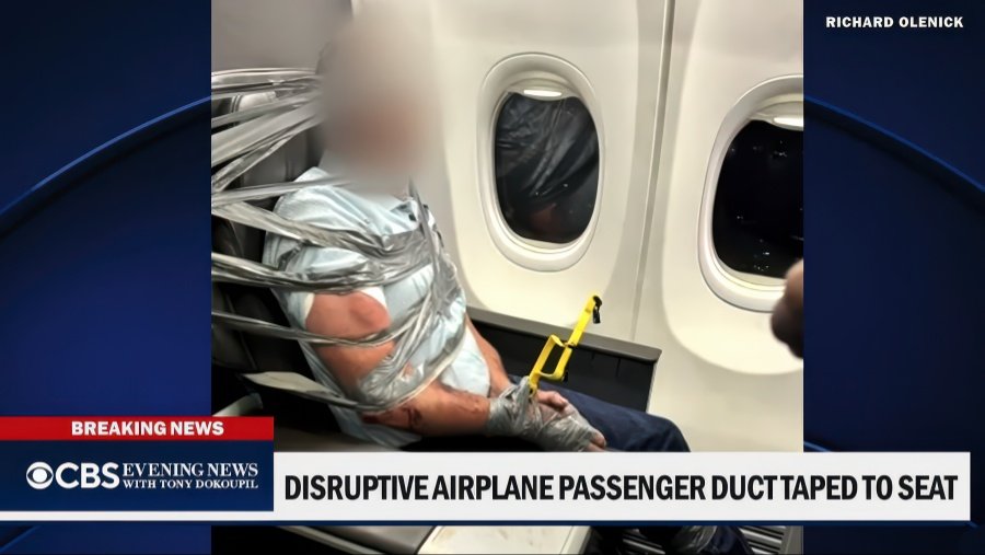Passenger on American Airlines was duct taped to his seat after becoming unruly yelling racist and homophobic slurs